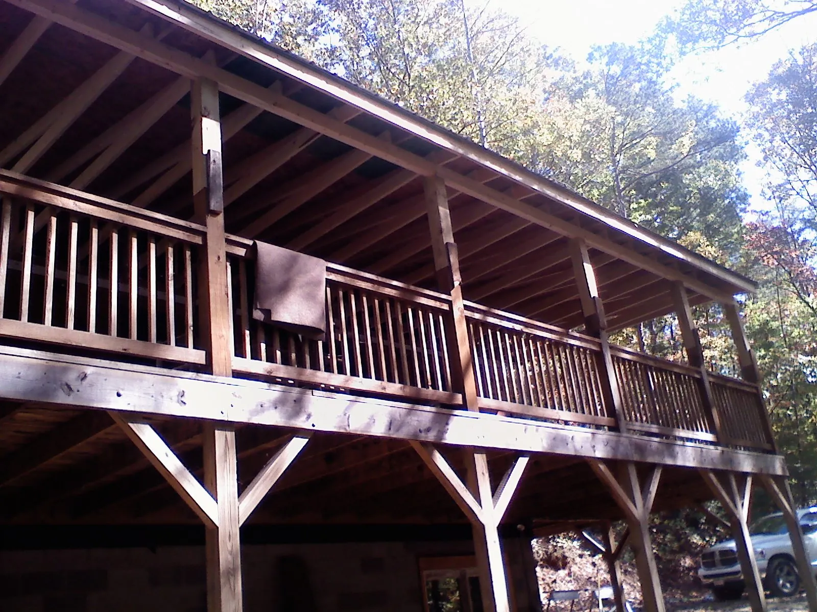 Timber framing under a new elevated porch and deck — Roof Leak Repair in Manchester by Roofing Brothers